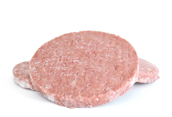 Üç donmuş hamburger köftesi — Stok fotoğraf