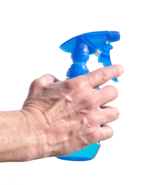 Butelka z rozpylaczem niebieski przytrzymanie ręka — Zdjęcie stockowe