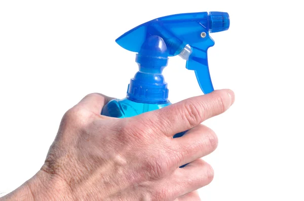 Mano sosteniendo botella de aerosol azul — Foto de Stock