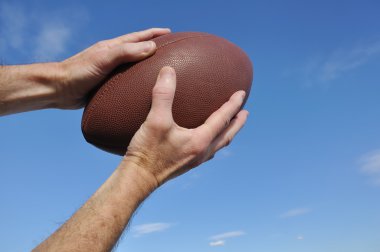 Receiver Catching an American Football Pass clipart