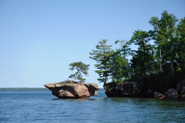 Rock Off Basswood Island of the Apostle Islands clipart