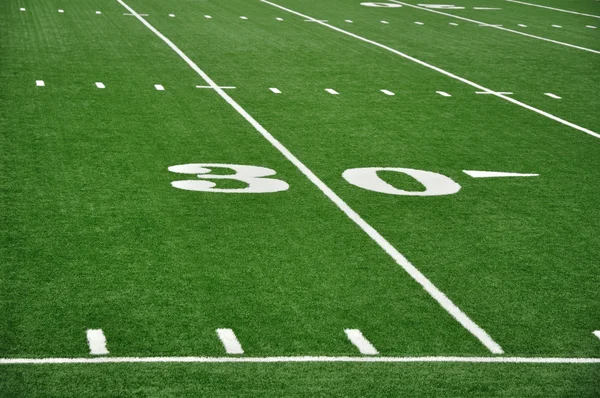 Dertig yard lijn op Amerikaanse voetbalveld — Stockfoto