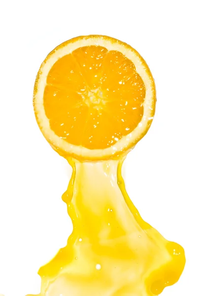 Orangensaft spritzt — Stockfoto