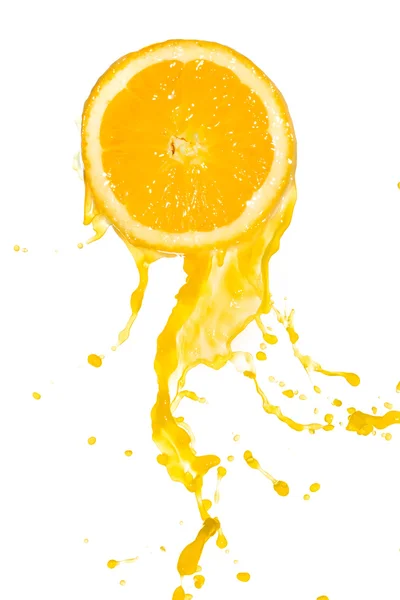 Appelsiinimehua roiskeita — kuvapankkivalokuva