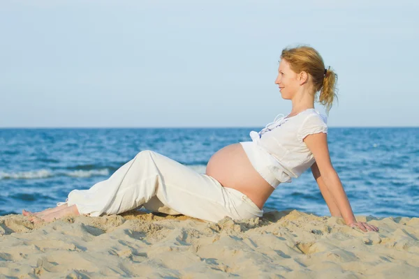 stock image Pregnant woman on beach