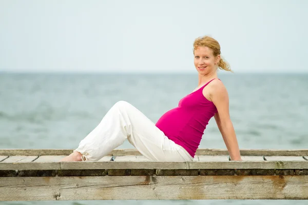 stock image Pregnant woman on beach