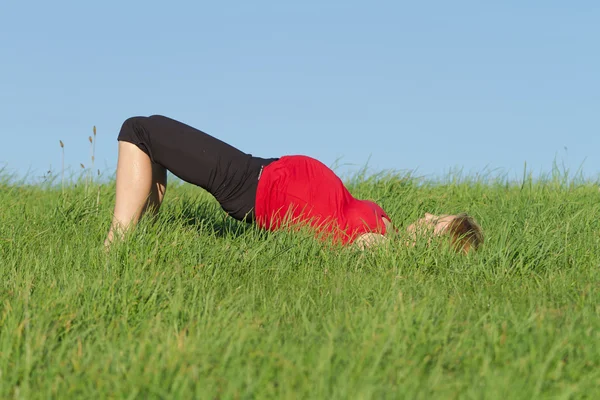 stock image Pregnant woman on meadow