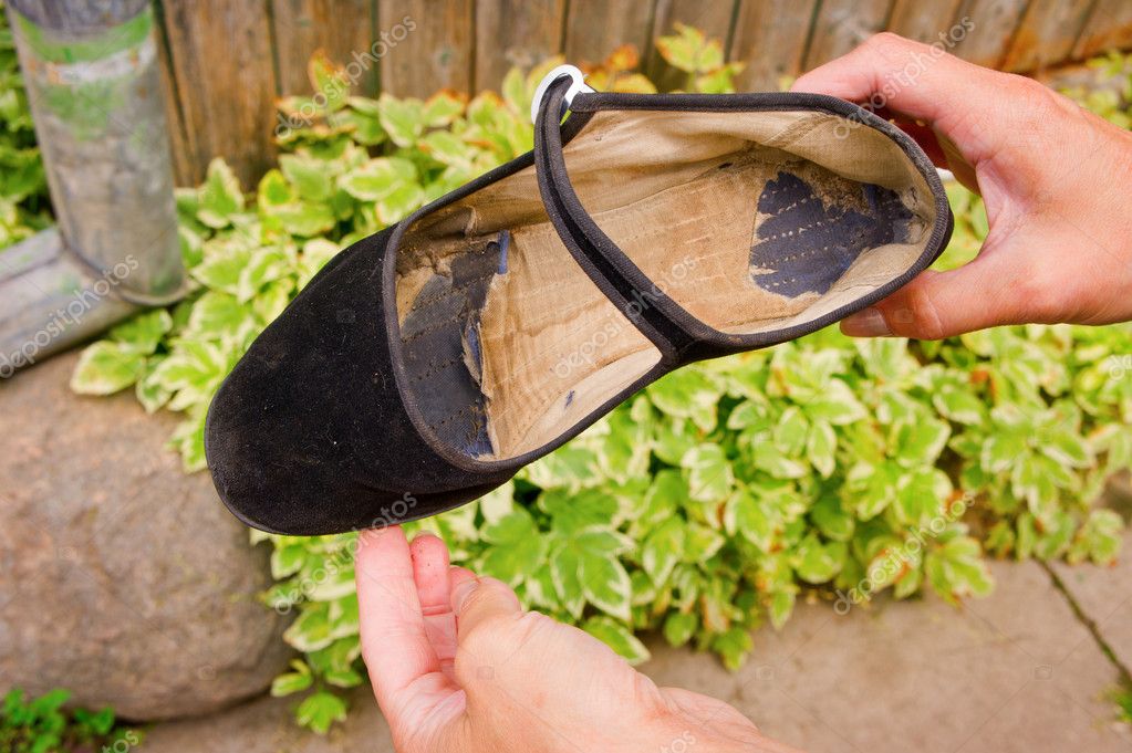 Damaged old women's shoes Stock Photo by ©ramvseb 6157686