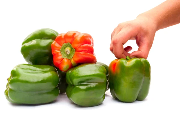 Zelené papriky a rukou teenager — Stock fotografie
