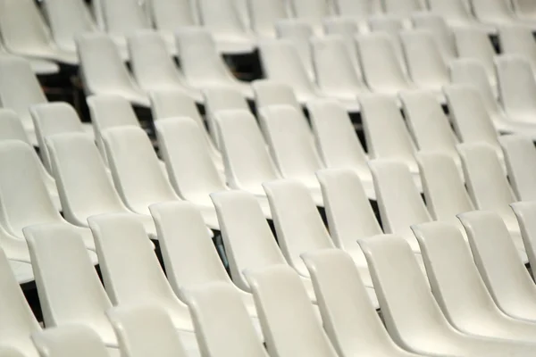 Array of white chairs — Stock Photo, Image