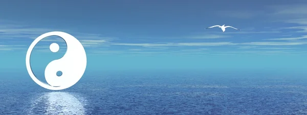 Инь и Янь в голубом океане — стоковое фото