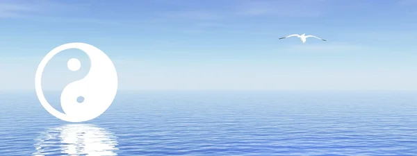 Інь і ян на блакитному океані — стокове фото