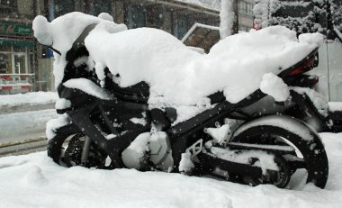 Motorbike by winter clipart