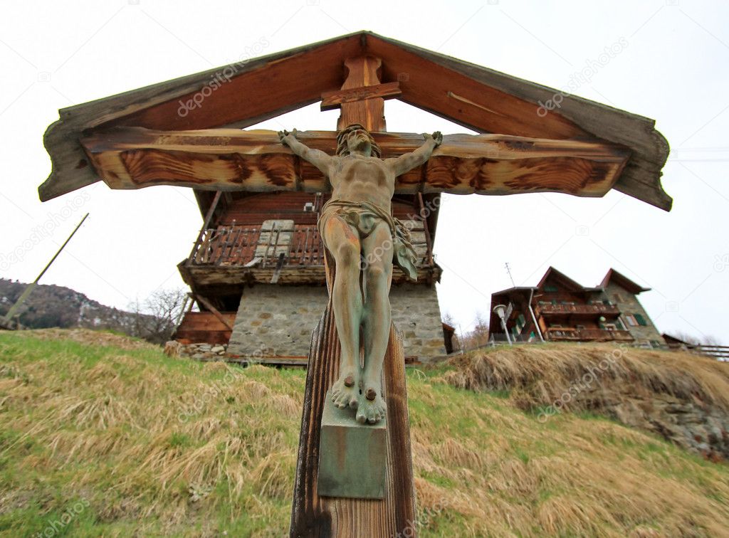 Wood Jesus cross in the mountain