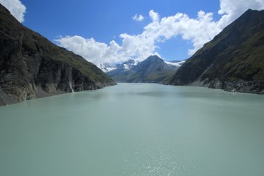 Grande Dixence dam view on Lac des Dix lake, Switzerland clipart