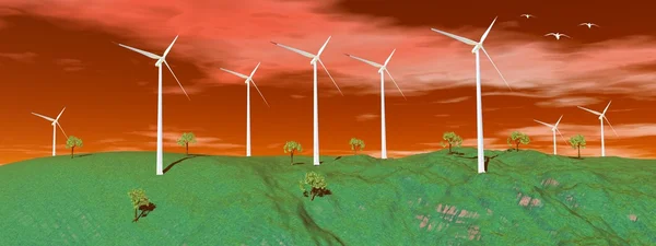 Wind turbines in nature by sunset — Stock Photo, Image