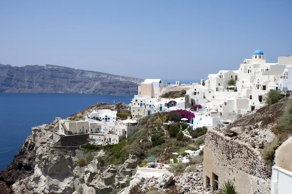 Vesnici oia na ostrově santorini, Řecko. — Stock fotografie
