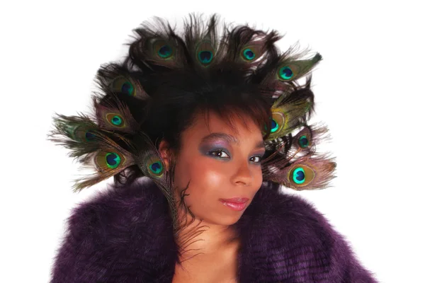 African American woman with Peacock feathers in her hair — Stock Photo, Image