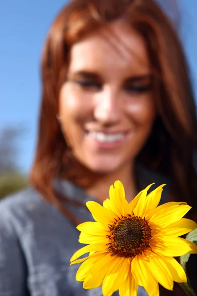 Red Haired Woman Outdoors in a Sunflower Field — Stock Photo, Image