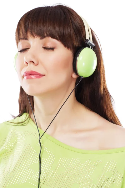 Beautiful girl with green headphones — Stock Photo, Image