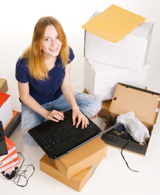 Young woman surfing an online store clipart
