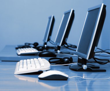 Computers standing in a row clipart