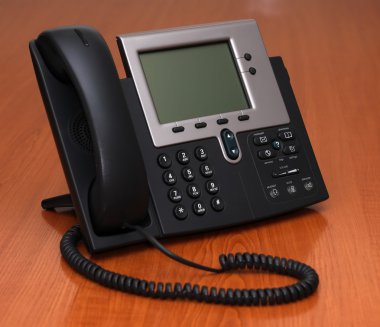 IP Phone on a table clipart