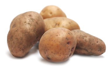 Pile of organic raw potatoes clipart