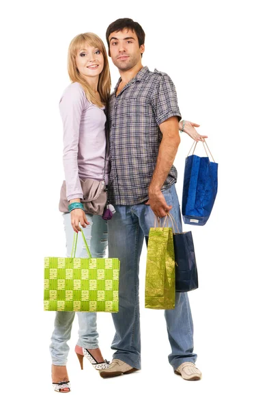 Νεαρό ζευγάρι με τσάντες για ψώνια — Φωτογραφία Αρχείου