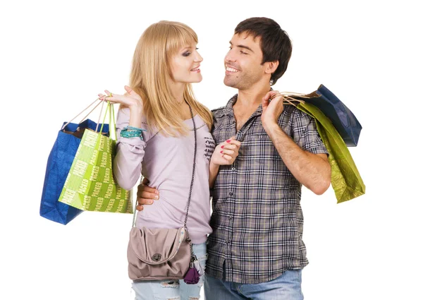 Casal alegre com sacos de compras — Fotografia de Stock
