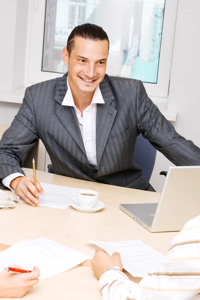 Young businessman having a conversation — Stock Photo, Image