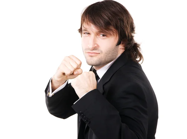 Молодий бізнесмен в позі боксу — стокове фото