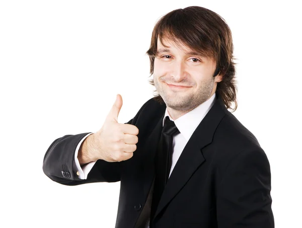 Handsome businessman showing thumbs up — Stock Photo, Image