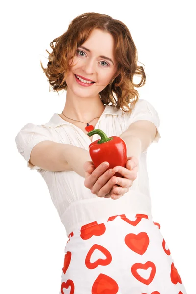 Mladá krásná žena drží paprikou — Stock fotografie
