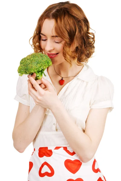 Jovem mulher bonita segurando um brócolis — Fotografia de Stock
