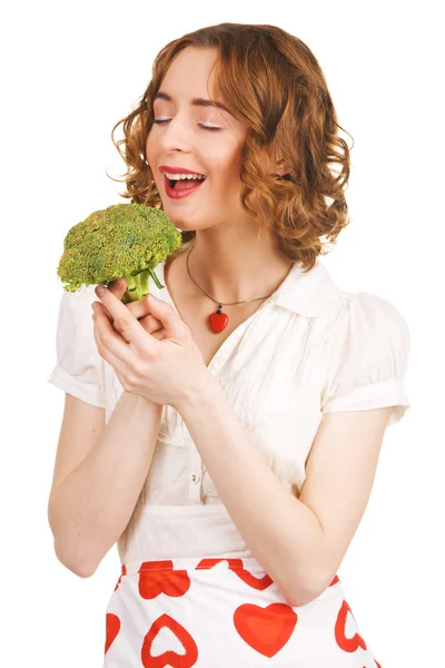 Bir brokoli tutan genç güzel kadın — Stok fotoğraf