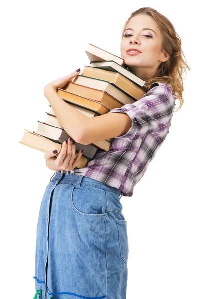 Härlig tjej med en trave böcker — Stockfoto