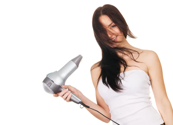 Woman with a hair dryer — Stock Photo, Image
