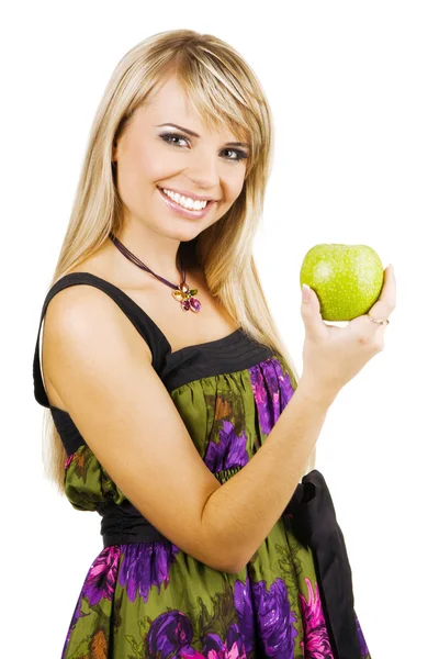 Cheerful young woman holding a fresh freen apple — Stock Photo, Image