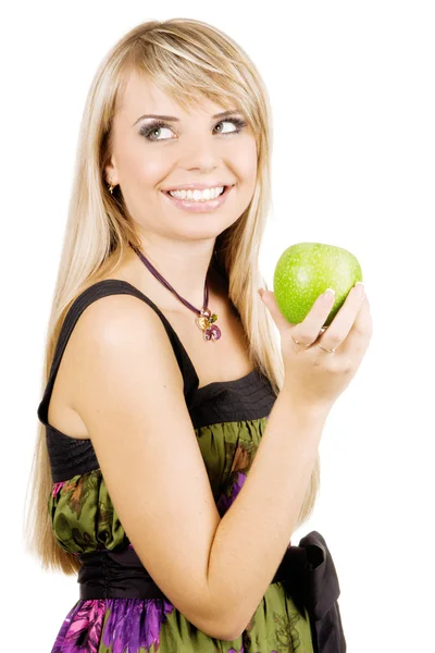 Wesoły młoda kobieta trzyma jabłko świeże — Zdjęcie stockowe