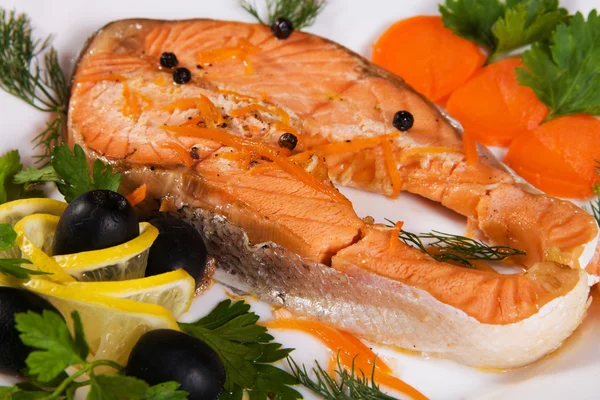 Salmon served with olives and lemon — Stock Photo, Image