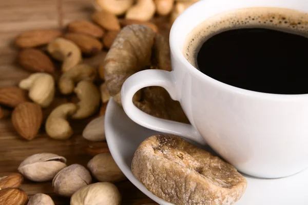 Coffee with nuts and dried fig — Stock Photo, Image