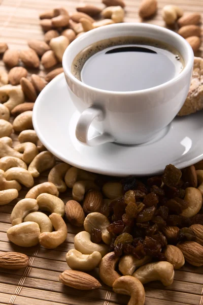 Coffee with nuts, fig and raisins — Stock Photo, Image