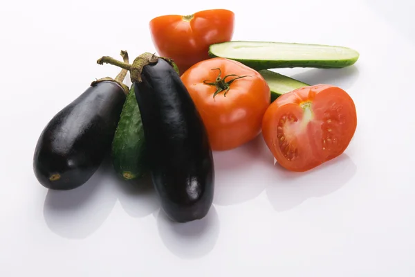 Tomatoes and cucumbers — Stock Photo, Image