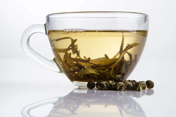 Glass cup of fresh white tea — Stock Photo, Image