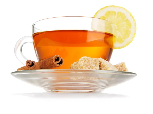 Cup of tea with lemon, cinnamon and sugar — Stock Photo, Image