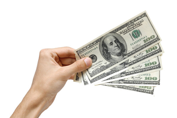 Рука держит доллары США
