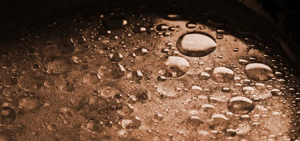 Abstracte beeld van olie druppels in water — Stockfoto