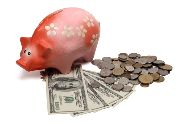 Piggy bank with dollar bills and coins — Stock Photo, Image
