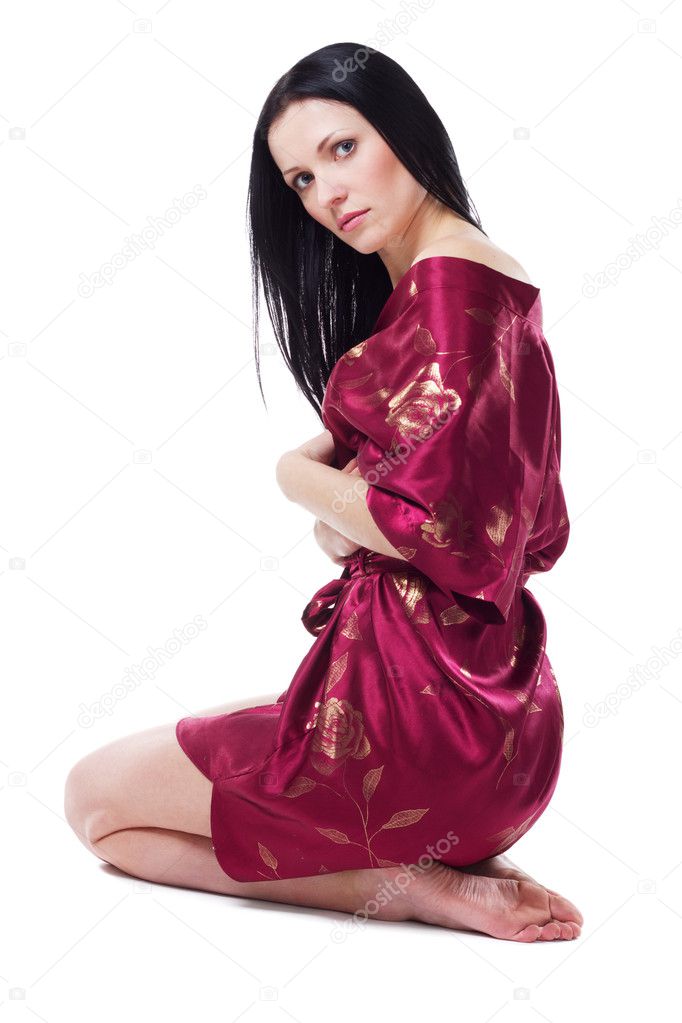 Beautiful woman in red dressing gown